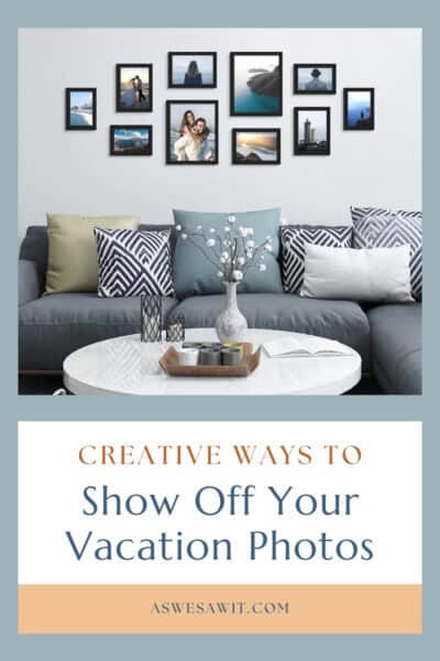 Photos on a Living Room wall above a sofa. Coffee table in the foreground. The text overlay says "Creative ways to show off your vacation photos"
