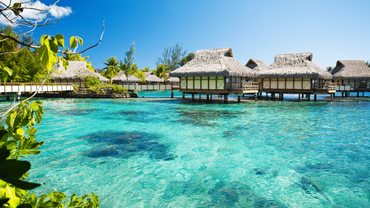 Over water bungalows next to a lagoon in Maldives Islands