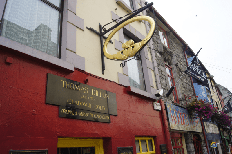 Sign in the shape of a Claddagh Ring sticking out from the original store, Thomas Dillon Galway Ireland