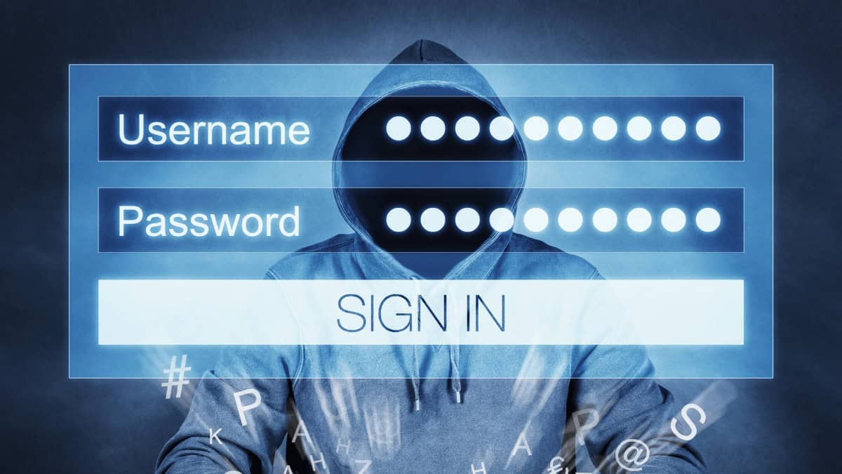 Secure online shopping: Hacker behind an overlay of a login box.