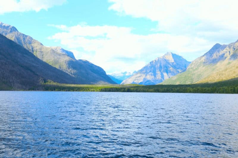peaceful Lake McDonald in Glacier National Park with mountains in the background