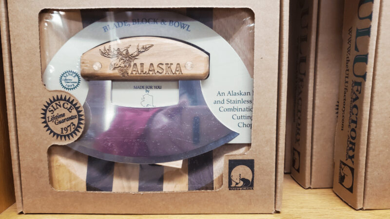 Ulu knife and bowl boxed as Alaska souvenirs.