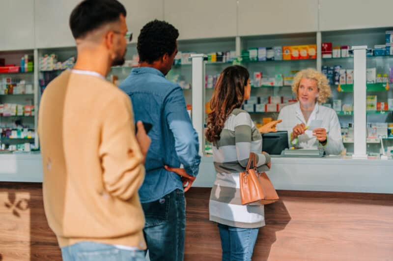 People standing in a queue at a store