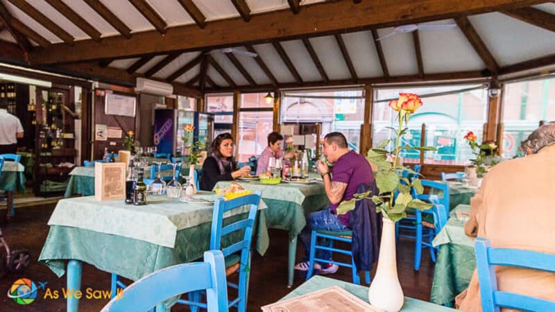 Outdoor tables at Il Giardino Sospeso, a trattoria in Civitavecchia’s historic ghetto district.