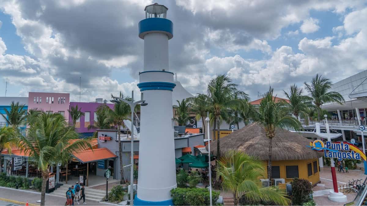 Punta Langosta cruise pier area in downtown Cozumel with lighthouse, shops, and restaurants near the cruise terminals