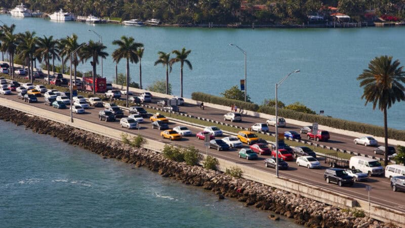 Heavy traffic along a Miami causeway near downtown during peak travel hours