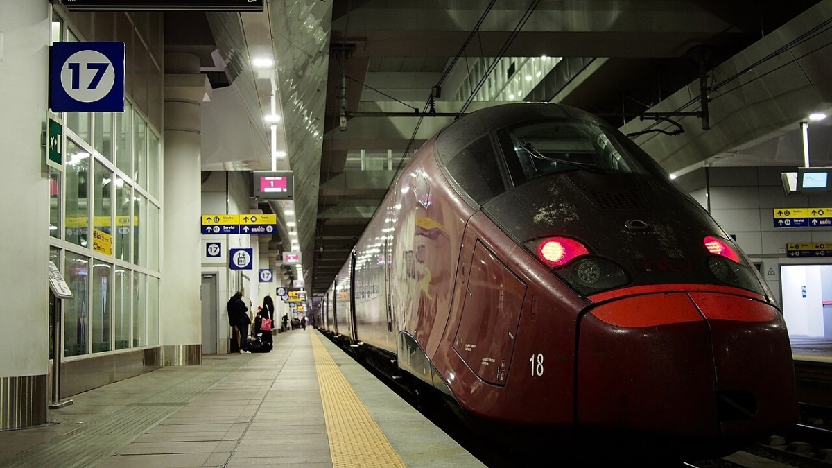 High-speed train waiting at Bologna Centrale railway station