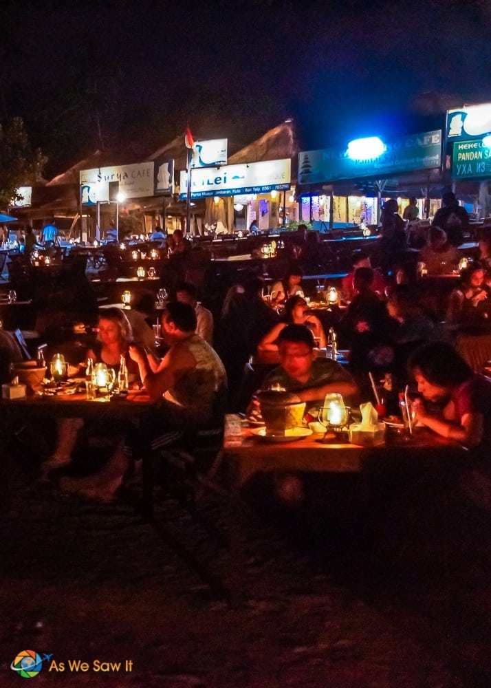 View of candlelit tables when looking back toward Jimbaran warungs