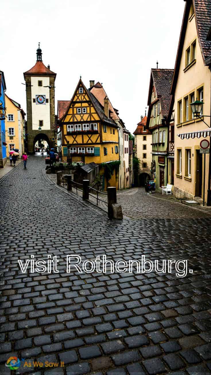 cobbled streets, tower and half-timbered houses. Text overlay says visit Rothenburg.