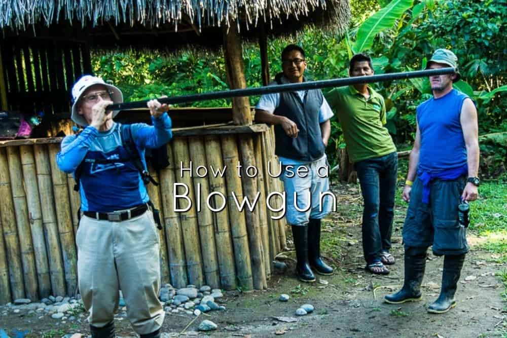 Roger tries his hand at blowing a dart gun