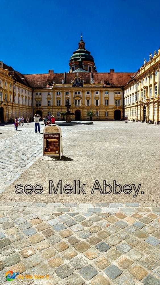 front of Melk Abbey. Text overlay says see melk abbey